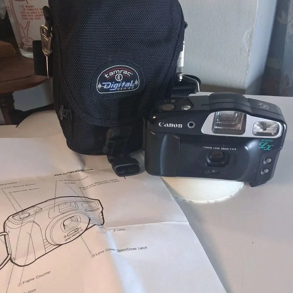 Canon Snappy LX Camera: Includes a 35mm f/4.5 lens, Auto Flash,plus Camera Case